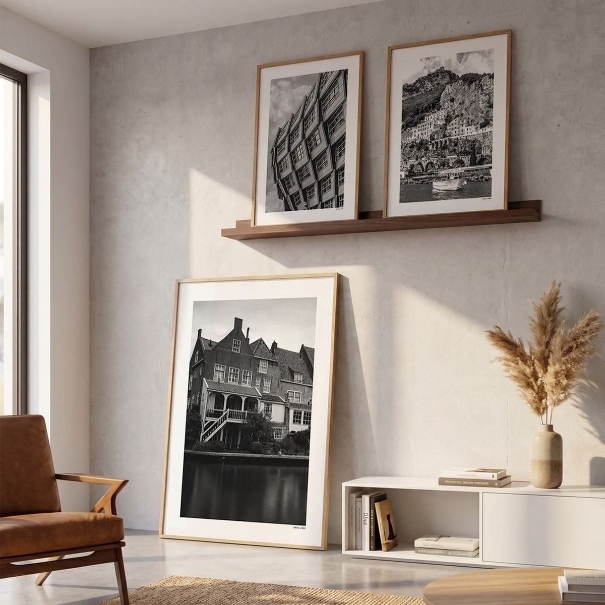 Drie fotoposters in woonkamer interieur - Zwart-Wit