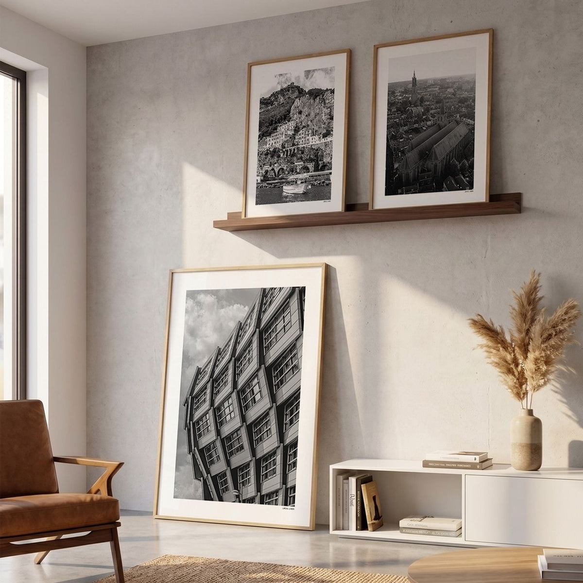 Drie fotoposters in woonkamer interieur - Zwart-Wit