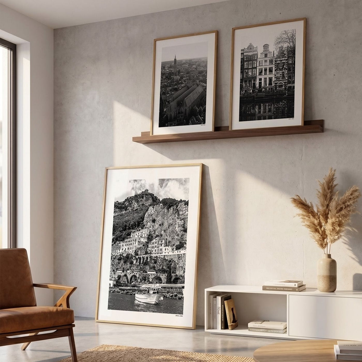 Drie fotoposters in woonkamer interieur - Zwart-Wit