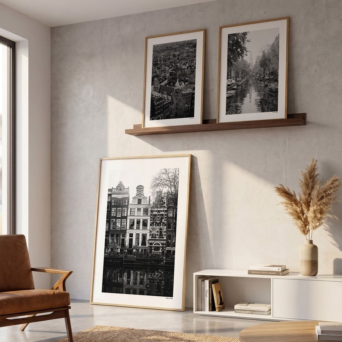 Drie fotoposters in woonkamer interieur - Zwart-Wit