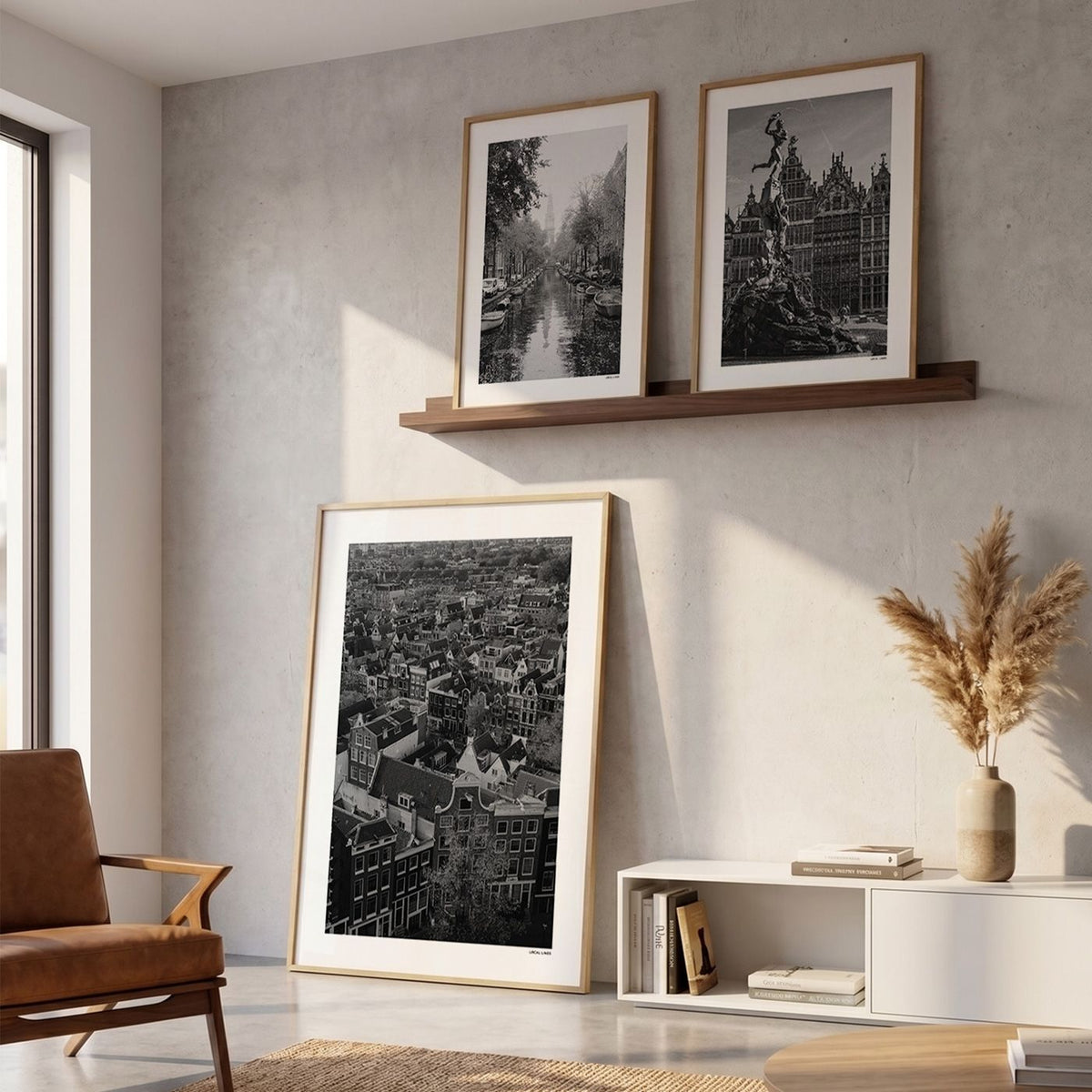 Drie fotoposters in woonkamer interieur - Zwart-Wit