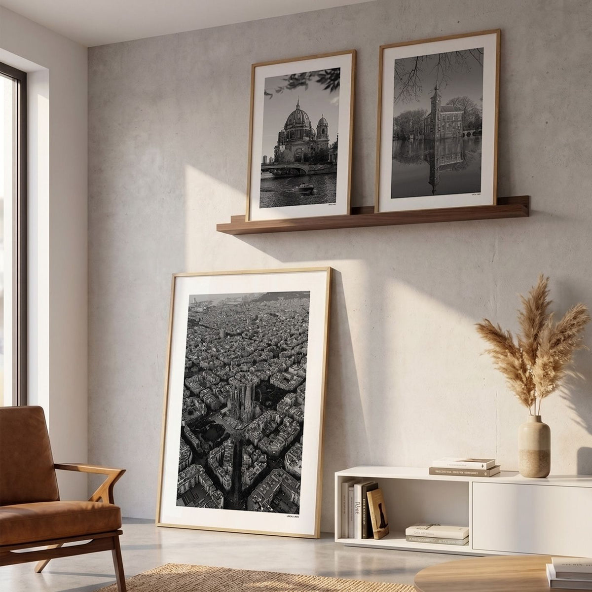 Drie fotoposters in woonkamer interieur - Zwart-Wit