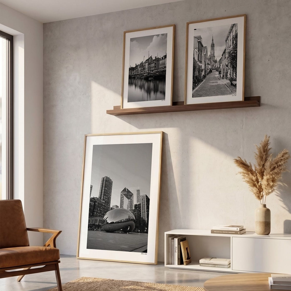 Drie fotoposters in woonkamer interieur - Zwart-Wit
