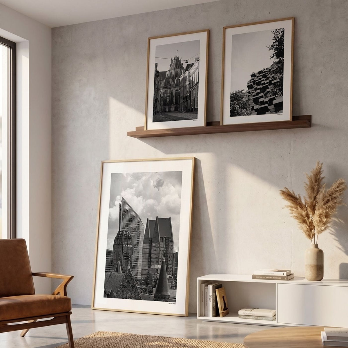 Drie fotoposters in woonkamer interieur - Zwart-Wit