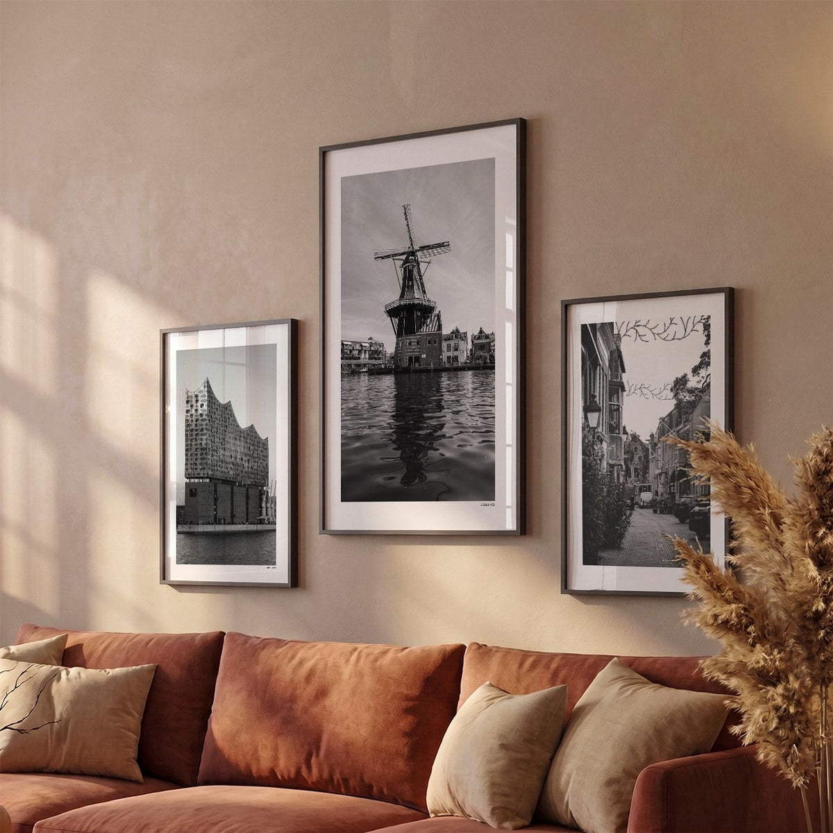 Drie Haarlem Klassiek fotoposters boven bank wanddecoratie - Zwart-Wit