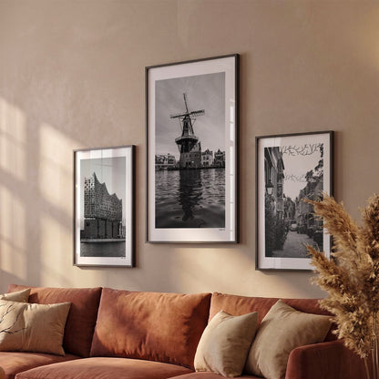 Drie Haarlem Klassiek fotoposters boven bank wanddecoratie - Zwart-Wit