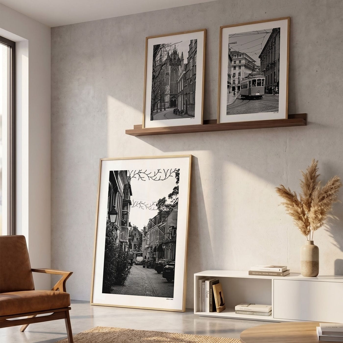 Drie fotoposters in woonkamer interieur - Zwart-Wit