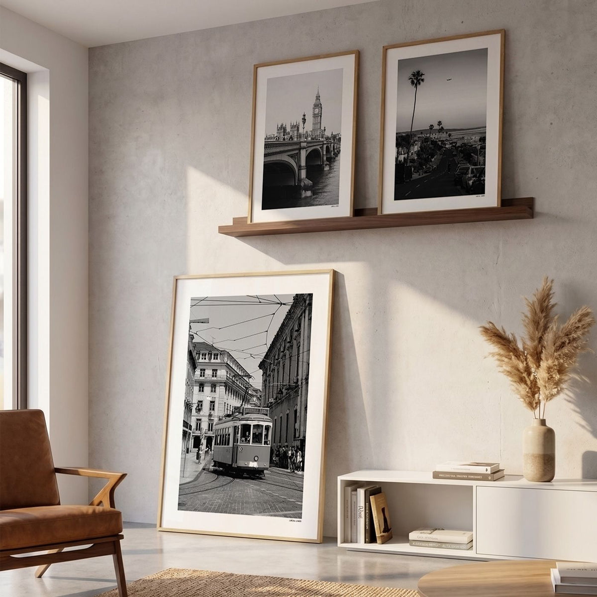 Drie fotoposters in woonkamer interieur - Zwart-Wit
