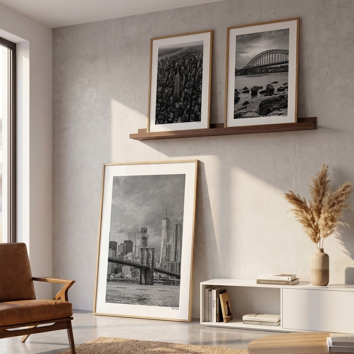 Drie fotoposters in woonkamer interieur - Zwart-Wit