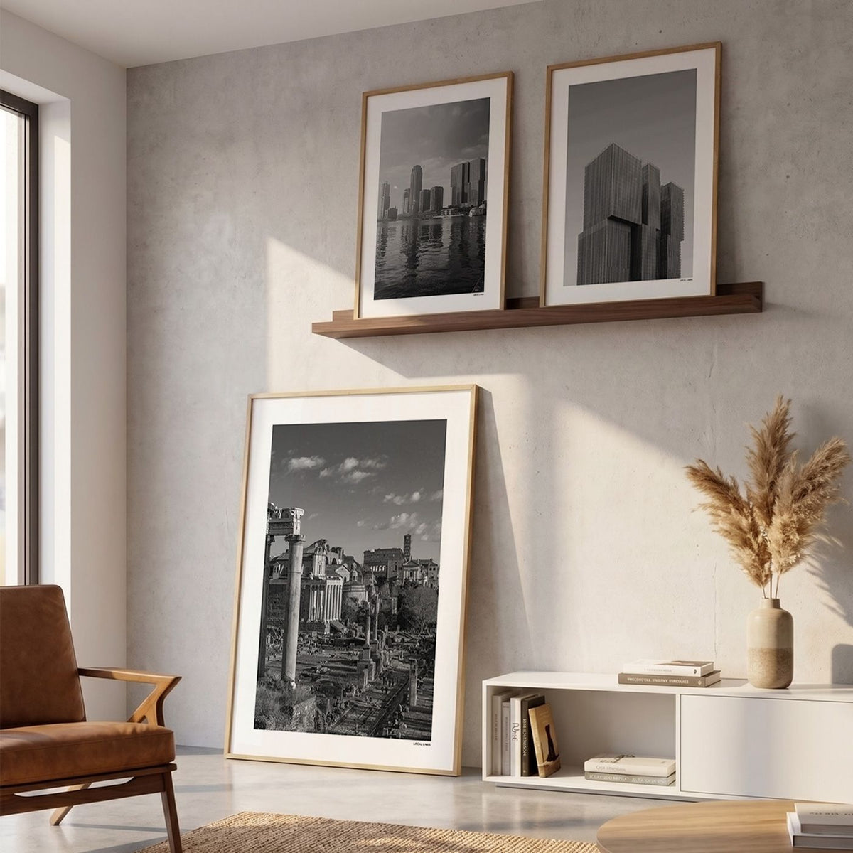 Drie fotoposters in woonkamer interieur - Zwart-Wit