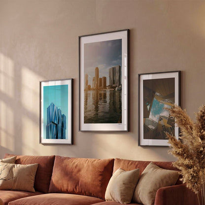 Drie Rotterdam Skyline fotoposters boven bank wanddecoratie - Kleur