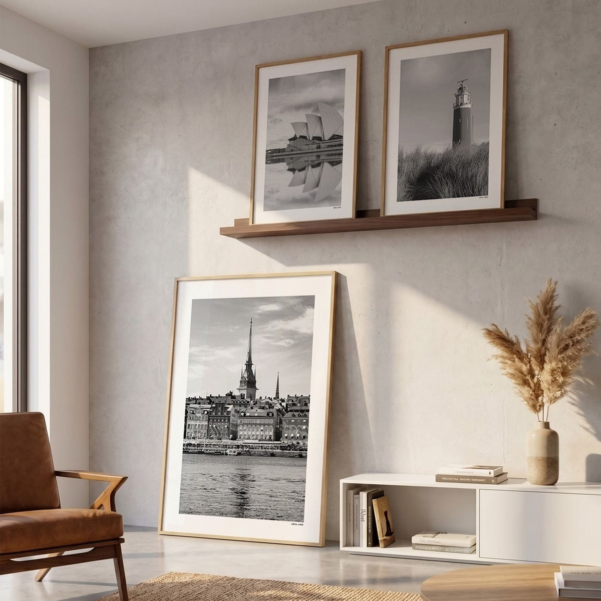 Drie fotoposters in woonkamer interieur - Zwart-Wit