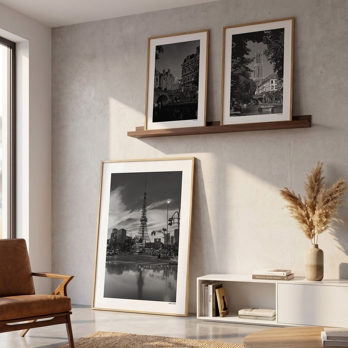 Drie fotoposters in woonkamer interieur - Zwart-Wit