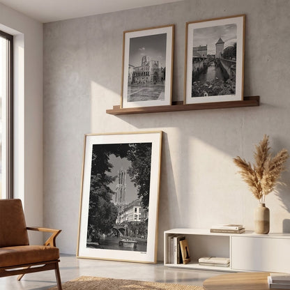 Drie fotoposters in woonkamer interieur - Zwart-Wit