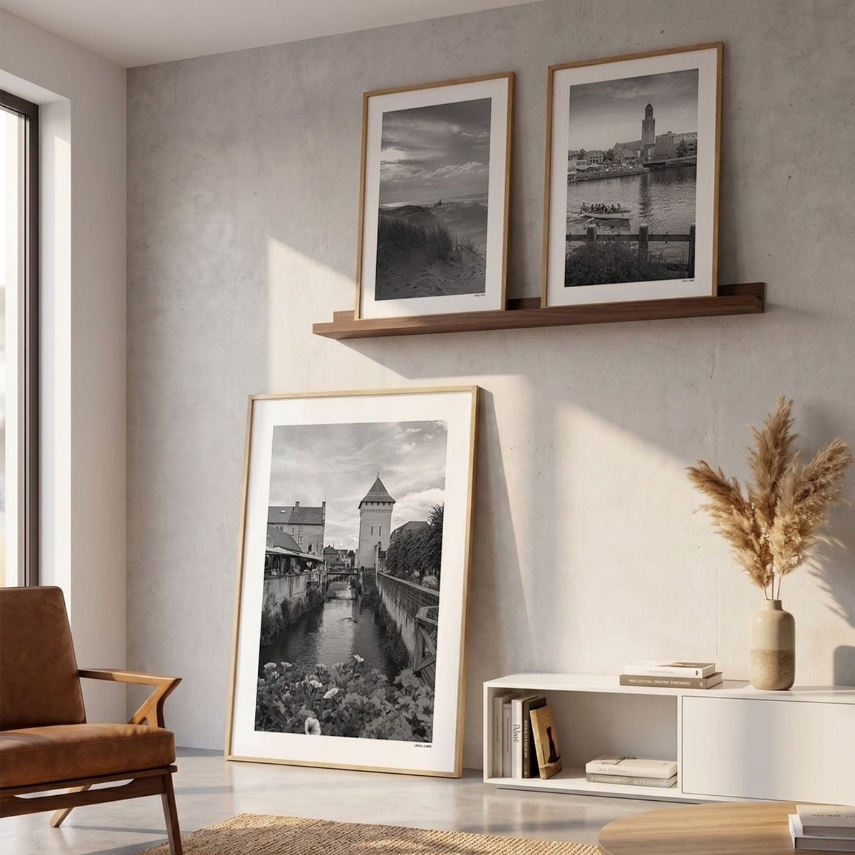 Drie fotoposters in woonkamer interieur - Zwart-Wit